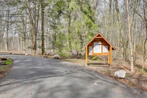 a sign on the side of a road at Charming Greenwich Escape Near Wooded Trails! in Cos Cob