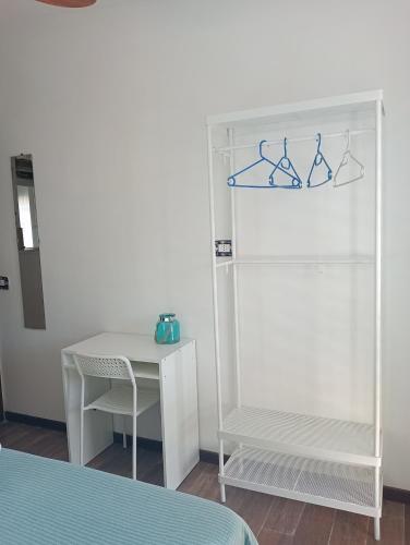 Letto o letti in una camera di B&B La Menaica