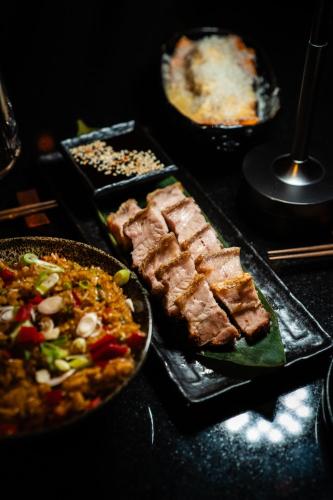 a table with different types of food on it at Cave Hotel & Golf Resort in Faversham