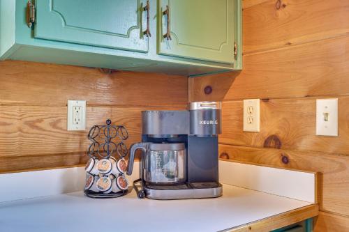 a coffee maker sitting on a counter in a kitchen at Cozy Cabin in Private Location with Hot Tub and Grill! in Blue Ridge