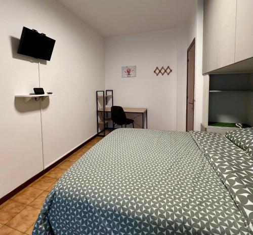 En eller flere senge i et værelse på Gubbiotti Appartamento Bilocale