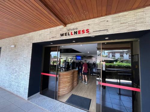 a building with a sign that reads show wellness at View467LifeResortBR in Brasilia