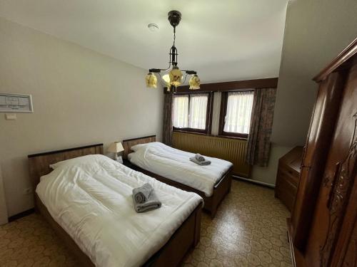 Postel nebo postele na pokoji v ubytování Vakantiehuis Santorini