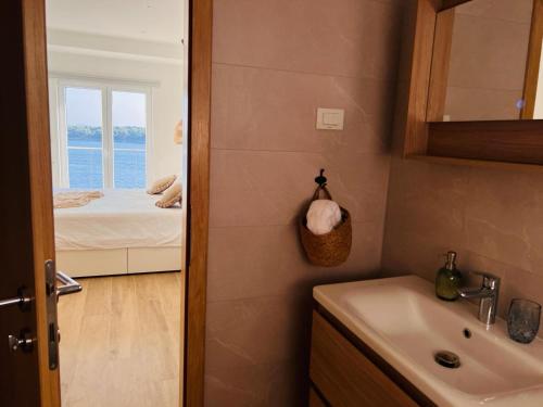 Postel nebo postele na pokoji v ubytování BohoSol House