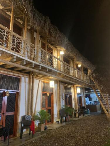 a building with a staircase and a balcony at Rincon del Mar Palomino in Palomino