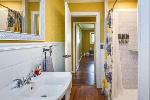 a bathroom with a sink and a shower at Cozy DuBois Home with Deck about 8 Mi to Treasure Lake! in DuBois