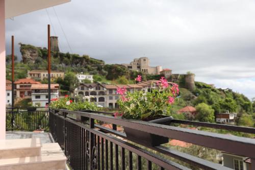 a balcony with a view of a city at --HOTEL DEAL-- Rooms With Castle View in Krujë