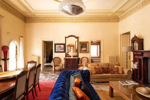 a living room with a couch and a table at Casa Victor Riu in Piera