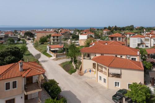 an aerial view of a small town with houses at Lakis House Nikiti in Nikiti
