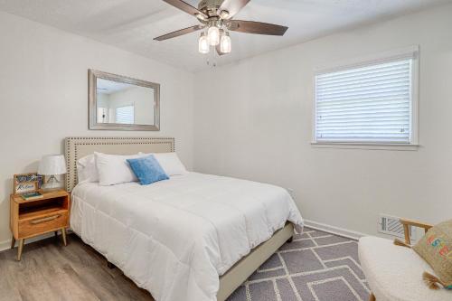 a bedroom with a bed and a ceiling fan at Modern Conyers Retreat - 9 Mi to Arabia Mountain! in Conyers