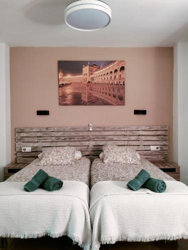 Postel nebo postele na pokoji v ubytování loft Alameda de Hercules