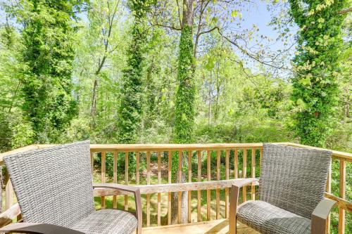 two chairs and a table on a deck at Modern Conyers Retreat - 9 Mi to Arabia Mountain! in Conyers