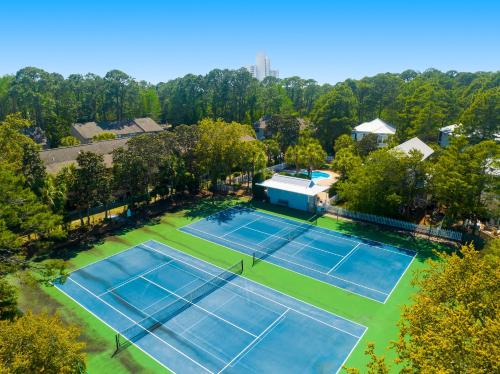 an overhead view of two tennis courts at Cassine Gardens by Panhandle Getaways in Santa Rosa Beach