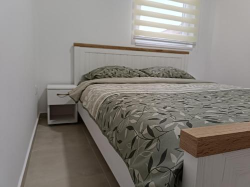 Postel nebo postele na pokoji v ubytování Apartman Spasić 2