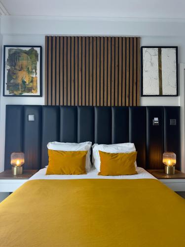 Ένα ή περισσότερα κρεβάτια σε δωμάτιο στο Hotel Don Rodrigues