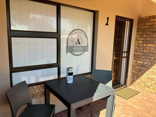 Χώρος καθιστικού στο Azalea Accommodation