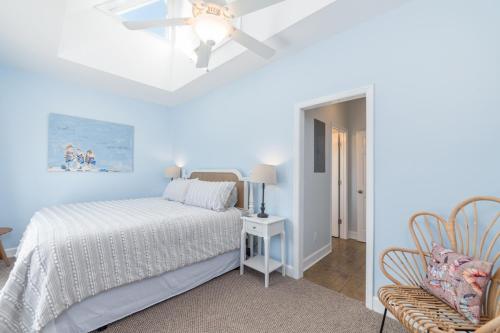 a bedroom with a bed and a ceiling fan at New Listing - Shrimp On Da Fly! in St. Helena Island