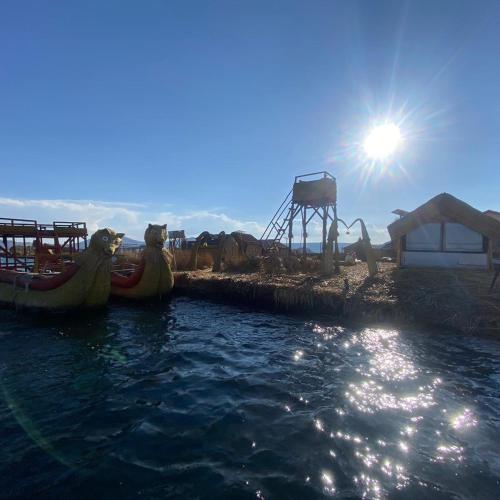 un parque acuático con un tobogán y una montaña rusa en Suma uta lodge, en Puno