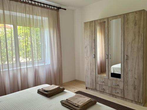 Ένα ή περισσότερα κρεβάτια σε δωμάτιο στο La mia casa