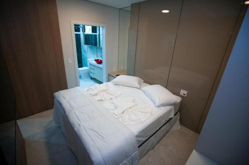 Postel nebo postele na pokoji v ubytování Foz Cobertura 3 suítes e Foz Apartamento 2 suítes