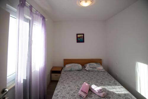 Voodi või voodid majutusasutuse Kadulja apartment toas