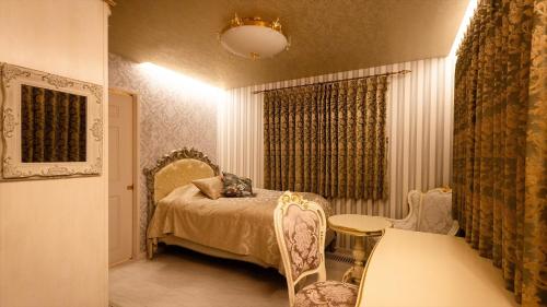En eller flere senge i et værelse på Ferri Endolph - Vacation STAY 50184v