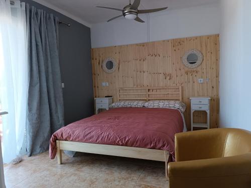 Ένα ή περισσότερα κρεβάτια σε δωμάτιο στο Hostal Bélgica