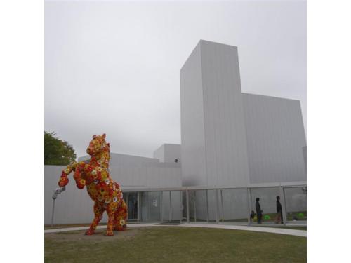a large bear statue in front of a building at Towada City Hotel - Vacation STAY 47272v in Towada