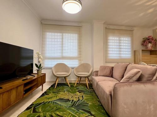 TV a/nebo společenská místnost v ubytování Piso en el corazón de Águilas