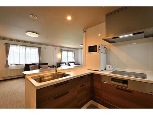 Kuchyň nebo kuchyňský kout v ubytování Hotel Takimoto - Vacation STAY 43488v