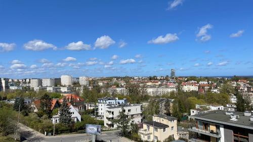 a view of a city with buildings and trees at Gdynia Riviera Hills in Gdynia