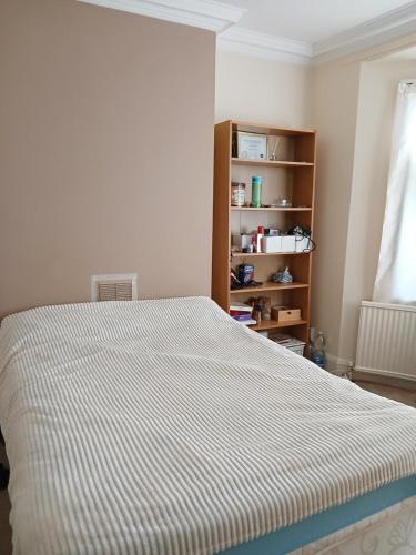 Posteľ alebo postele v izbe v ubytovaní Tooting house