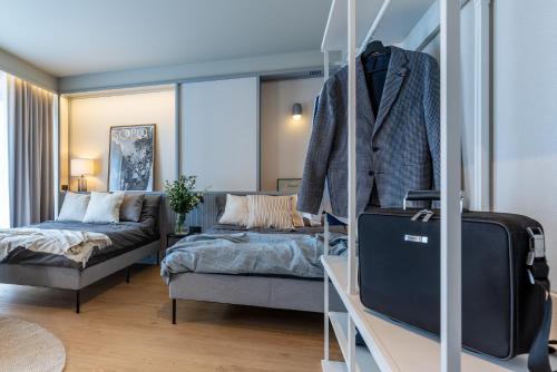 En eller flere senge i et værelse på Monciak Elegance - Molo