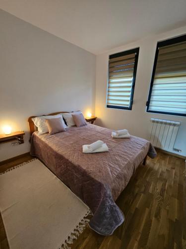 Postel nebo postele na pokoji v ubytování Aurora lux