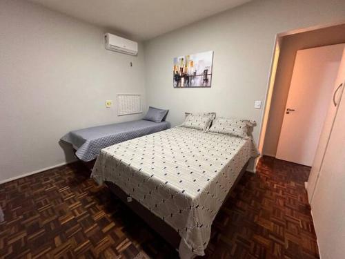 Een bed of bedden in een kamer bij Apartamento boa viagem