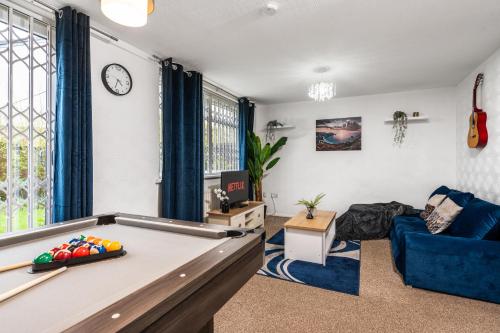 a living room with a pool table at Majestic Gem - Pool Table - Coop - Etihad - Parking in Manchester