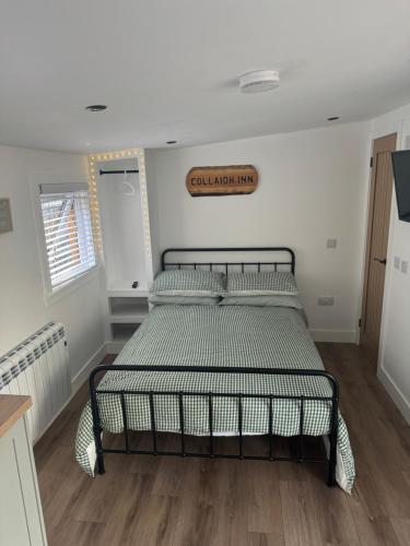 מיטה או מיטות בחדר ב-Collaidh Inn