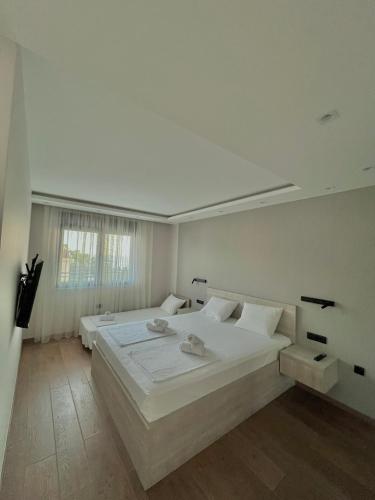 Katil atau katil-katil dalam bilik di Perla apartmani