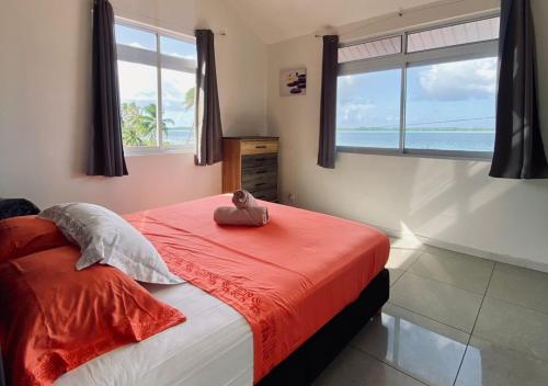 Postel nebo postele na pokoji v ubytování Villa Outuorau