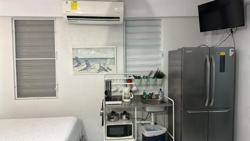 Η κουζίνα ή μικρή κουζίνα στο Playa Apartments