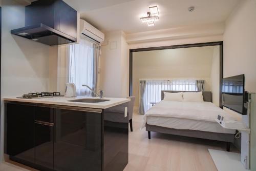 Katil atau katil-katil dalam bilik di Star Residence - 博多上呉服