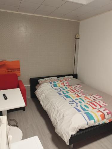 En eller flere senge i et værelse på Modern Lux studio