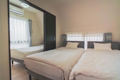 Katil atau katil-katil dalam bilik di Star Residence - 博多上呉服