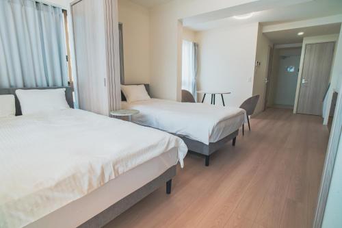 Katil atau katil-katil dalam bilik di Star Residence - 博多上呉服