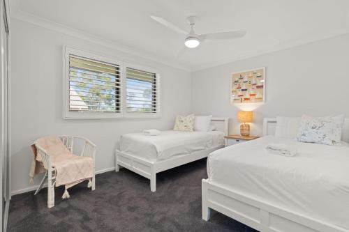 Postel nebo postele na pokoji v ubytování Inish by Experience Jervis Bay