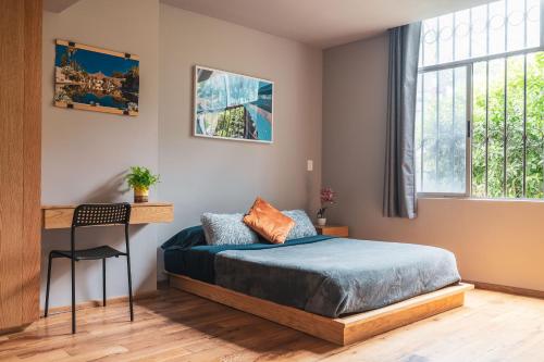 Giường trong phòng chung tại Casa Isolda