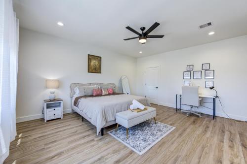 a bedroom with a bed and a ceiling fan at Exquisite House with rooftop in Houston in Houston