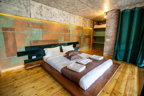 Ένα ή περισσότερα κρεβάτια σε δωμάτιο στο Miramare Residence Aparthotel