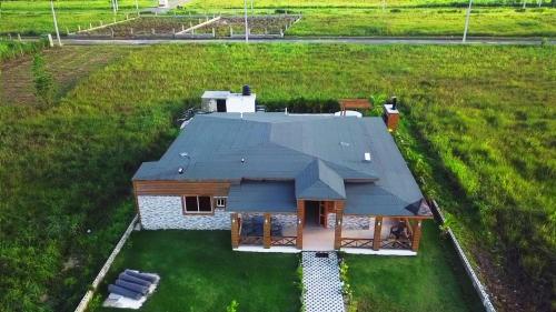 an overhead view of a house with a roof at Lujosa Villa Privada Con piscina in La Joya