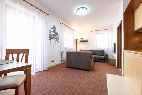 Posezení v ubytování Family & Friends Apartment